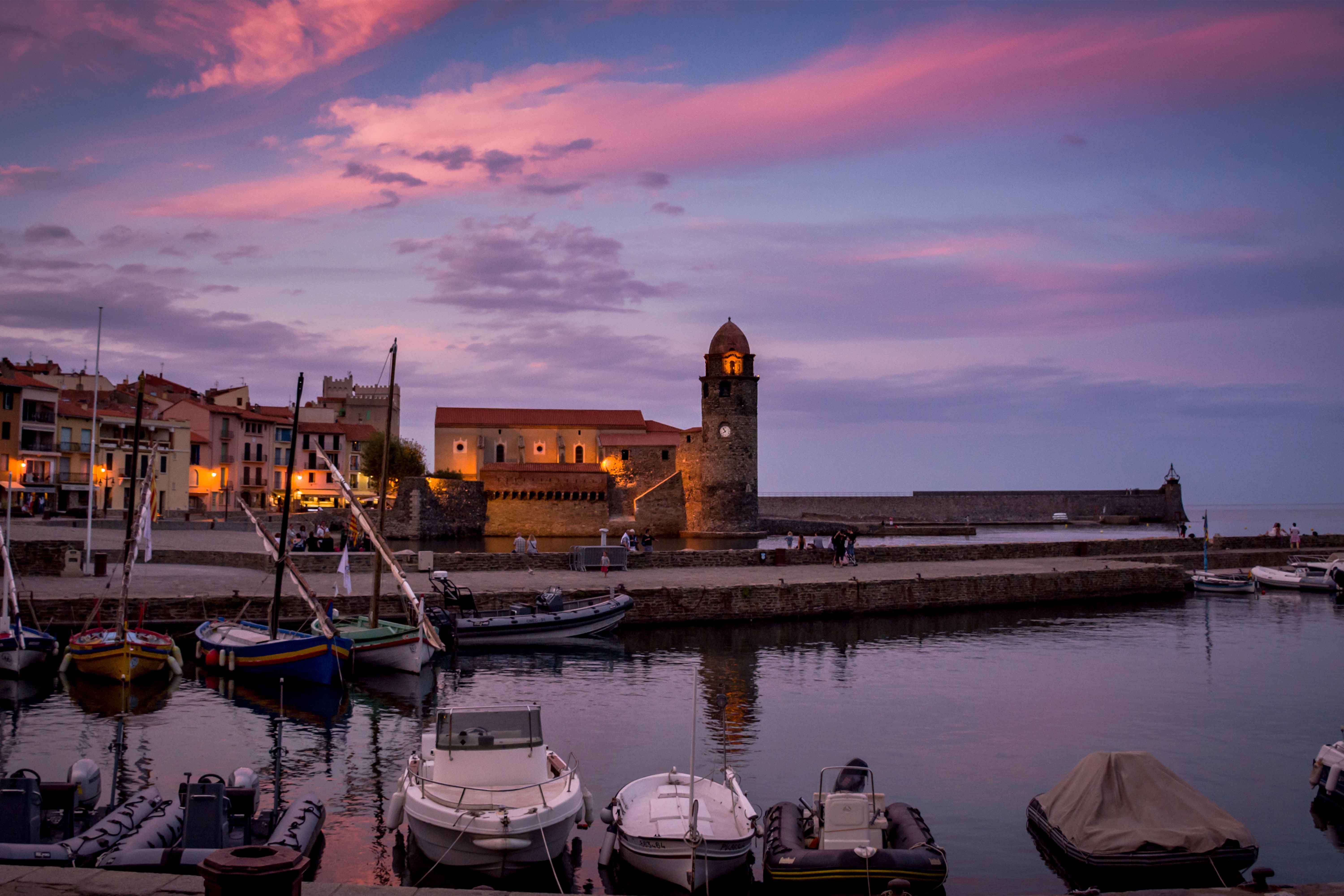 photo of lighthouse and boats at Collioure